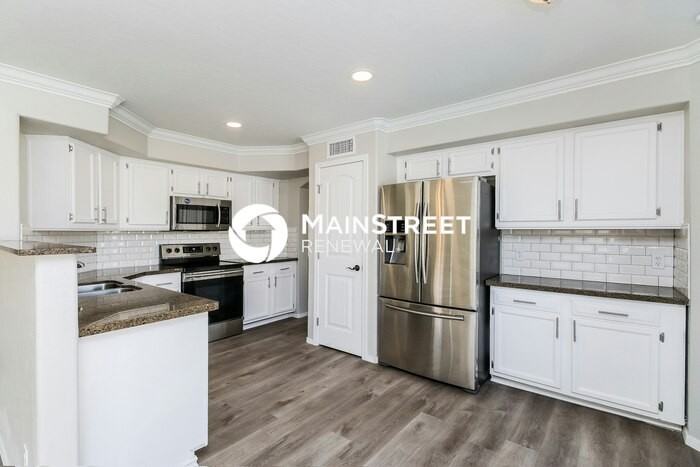 897 N Kingston St - Photo 4 of 17