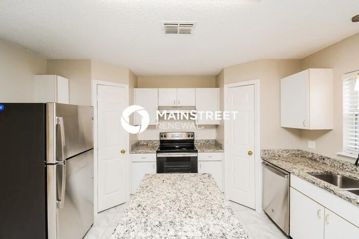 7306 Fox Grove Road - Photo 4 of 18