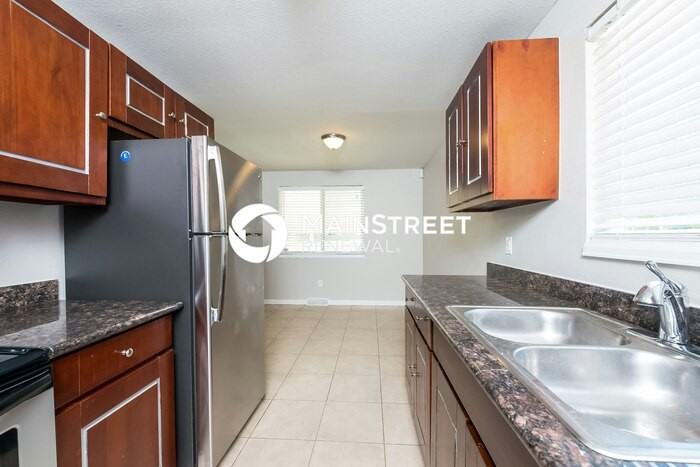 9320 W 104th Pl - Photo 5 of 17