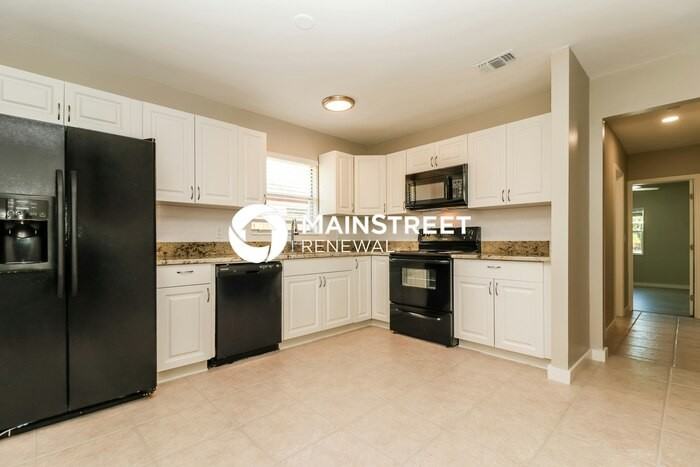 9537 Groveland St - Photo 5 of 16