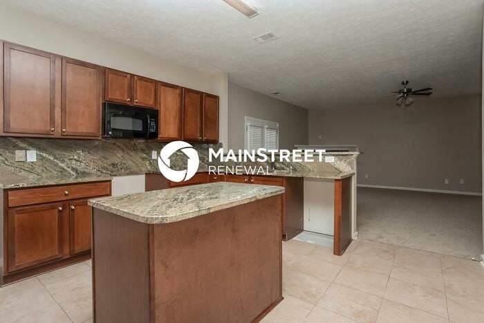 7159 Flagstone Pl - Photo 6 of 15