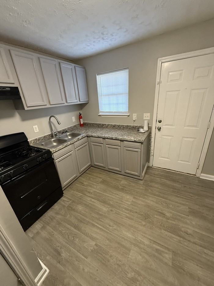1425 Joseph E Boone Blvd Nw #D103 - Photo 2 of 7