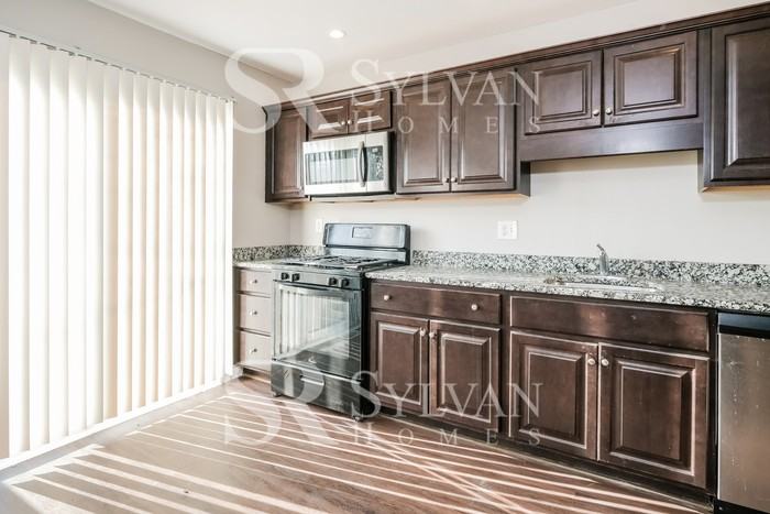 5703 Whitby Rd - Photo 7 of 15