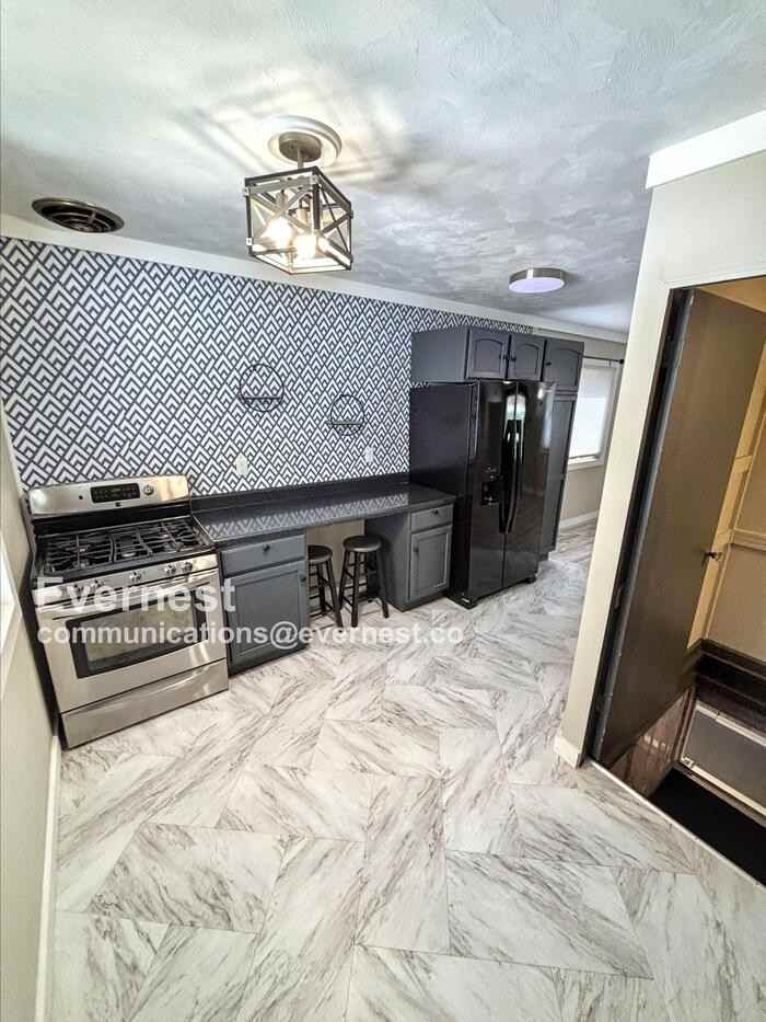 6511 Southwest Ave - Photo 2 of 23