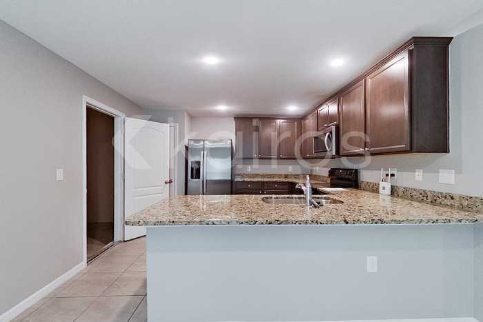 8502 Indian Laurel Ln - Photo 5 of 27