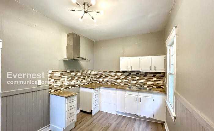 7129 3rd Ave S - Photo 2 of 16