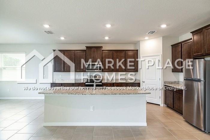 10913 Laxer Cay Loop - Photo 7 of 29