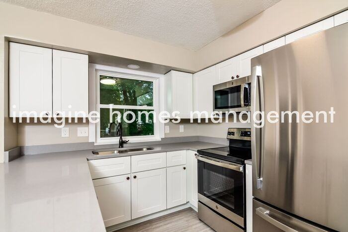 7301 79th Ave N - Photo 5 of 18