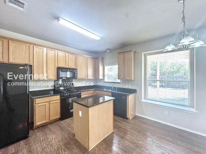 11503 Johnny Weismuller Ln - Photo 2 of 25