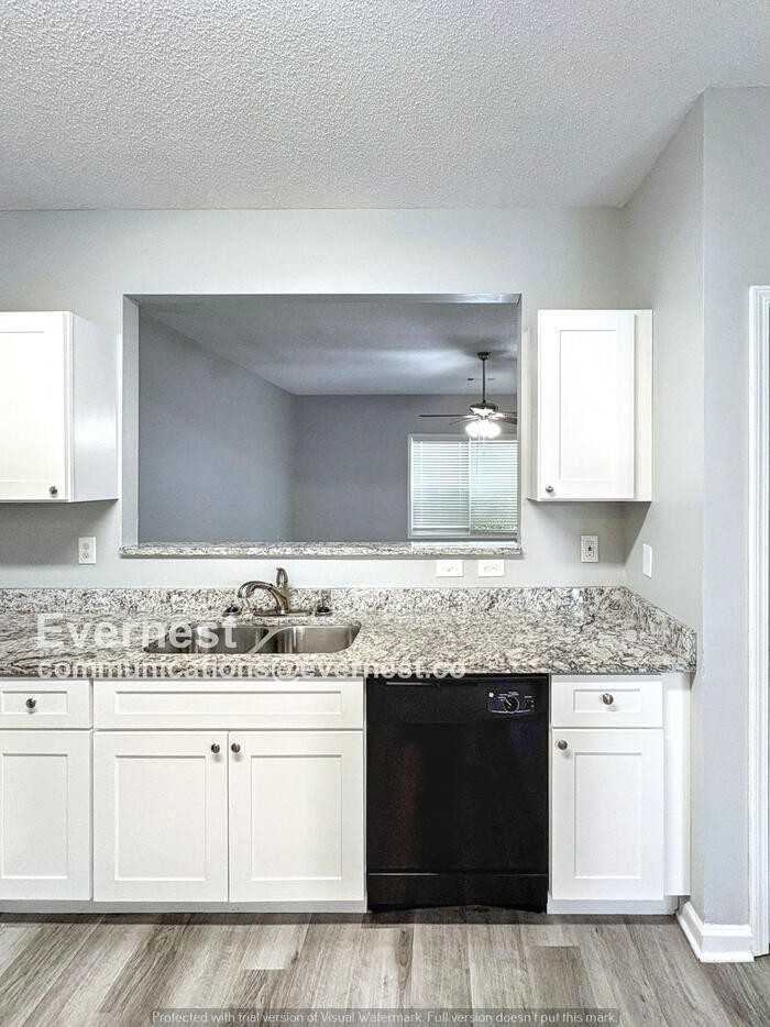 8609 Thomas Ln - Photo 3 of 14