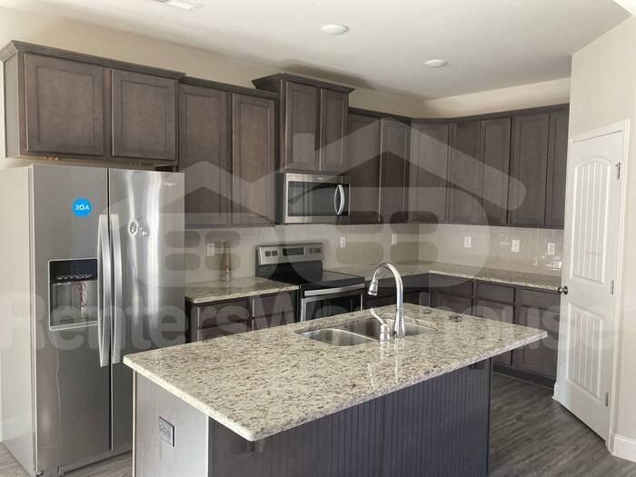 7113 Kingsbridge Lane Southeast - Photo 5 of 23