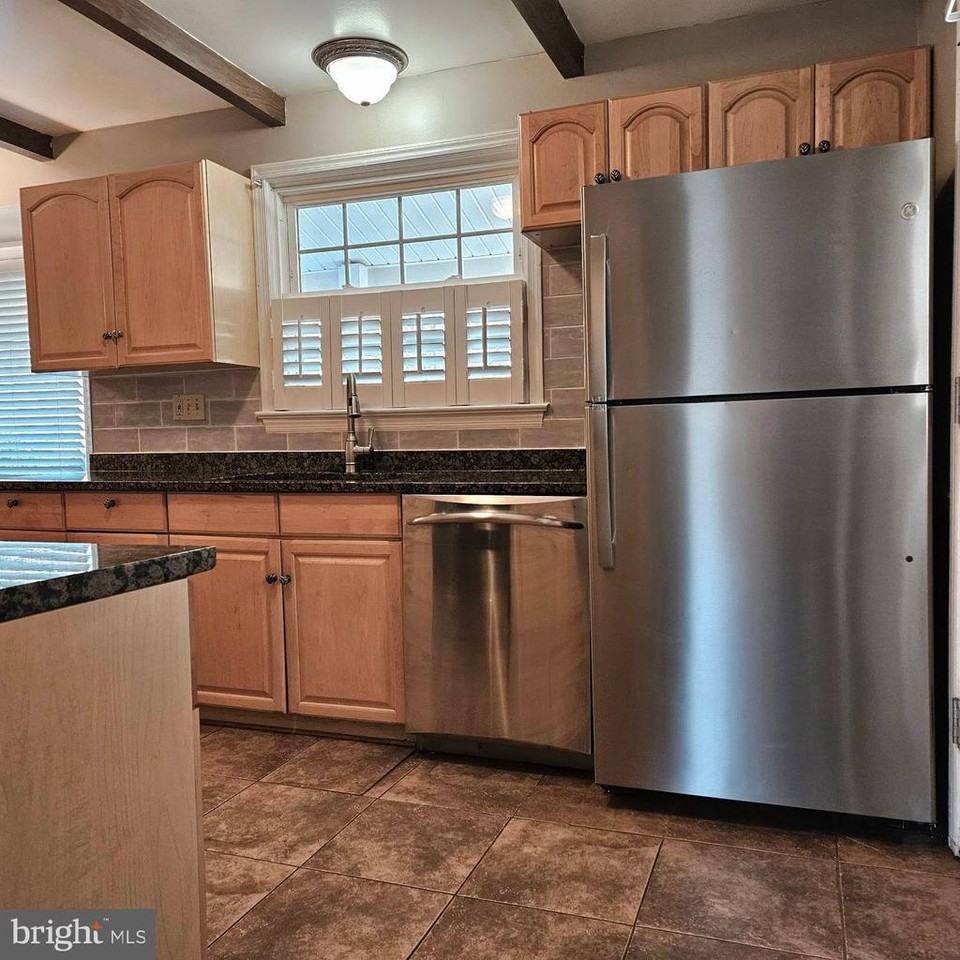 6602 Huntsman Blvd - Photo 4 of 14