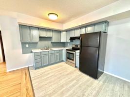 featured image of 115 E 5th St