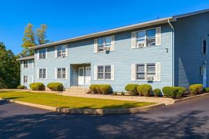 featured image of 115 E 5th St