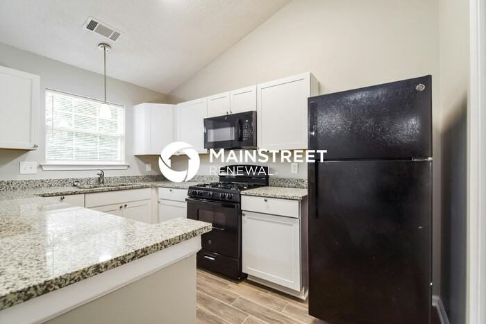 9407 Rollinghills Drive - Photo 5 of 17