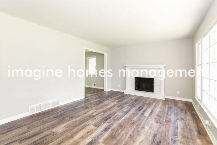 606 E 110th Ter - Photo 3 of 17