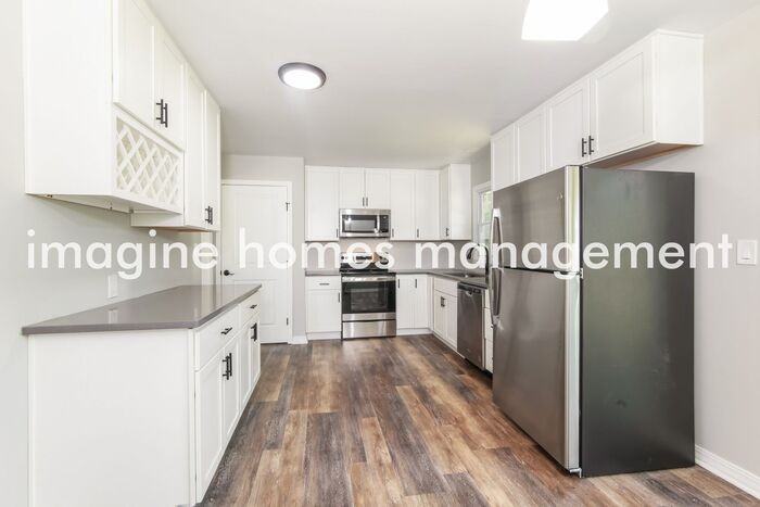 606 E 110th Ter - Photo 5 of 17