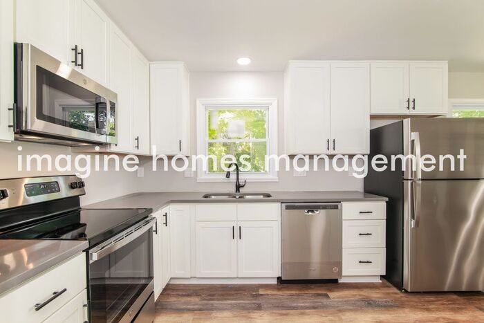 606 E 110th Ter - Photo 6 of 17