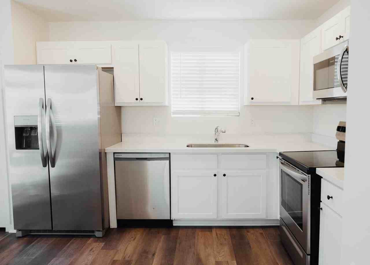 Apartment kitchen — representative home at The Chipman Apartments.
