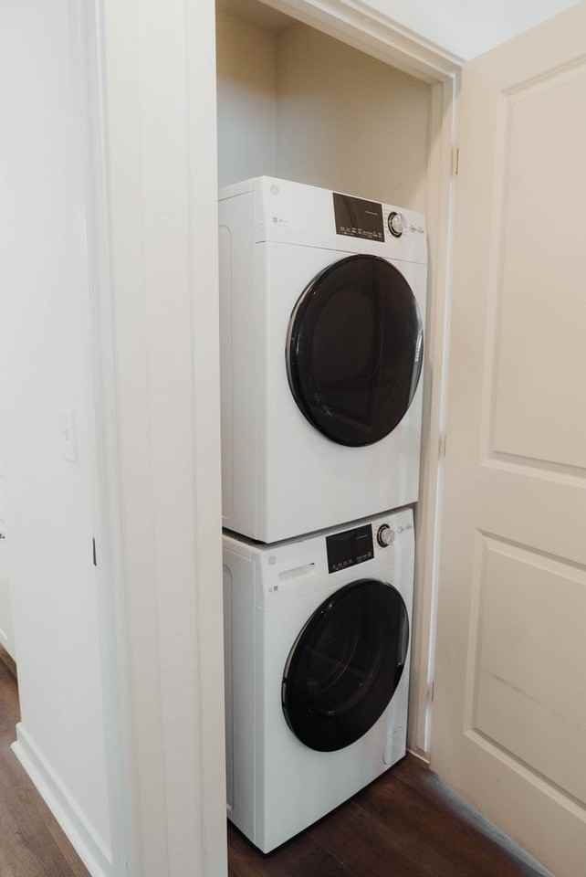 In-home laundry area — representative home at The Chipman Apartments.
