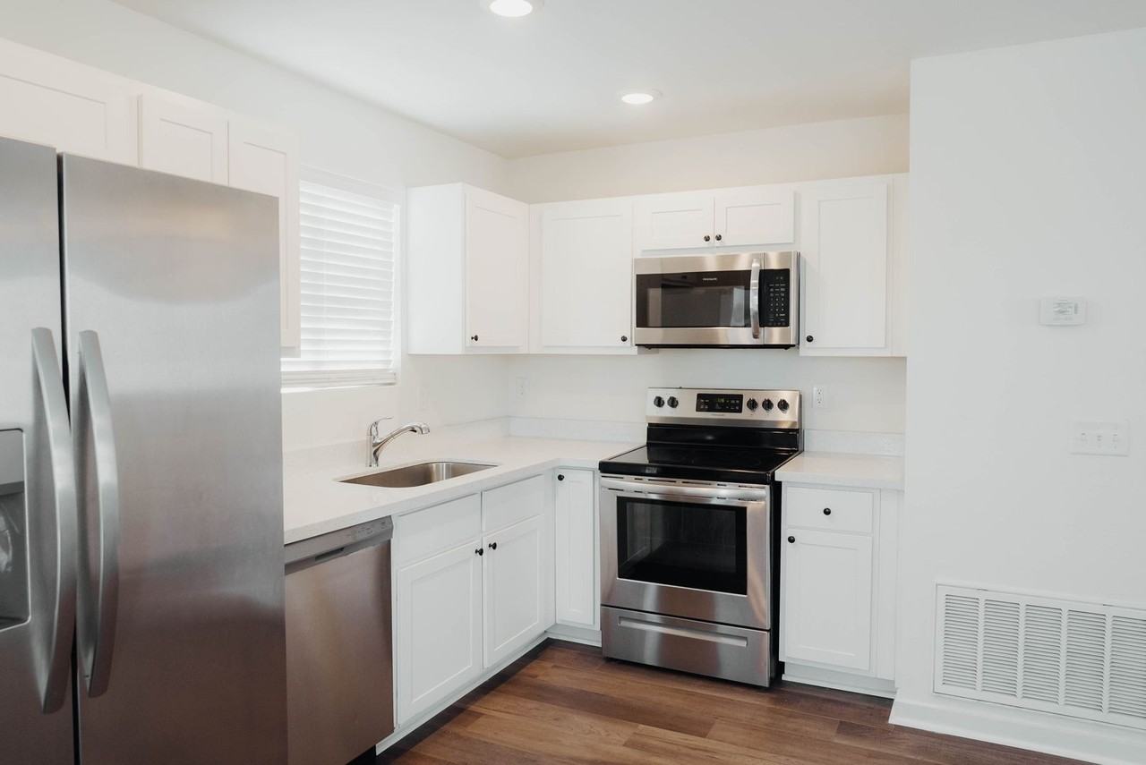 Apartment kitchen — representative home at The Chipman Apartments.