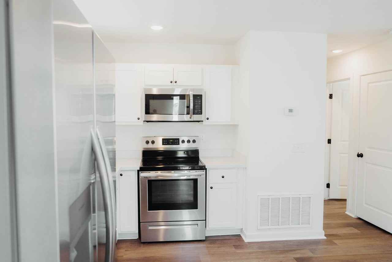Apartment kitchen — representative home at The Chipman Apartments.