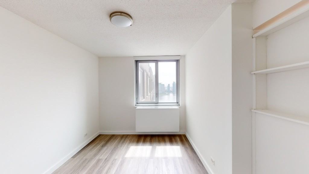 E 34th St #13B - Photo 2 of 13