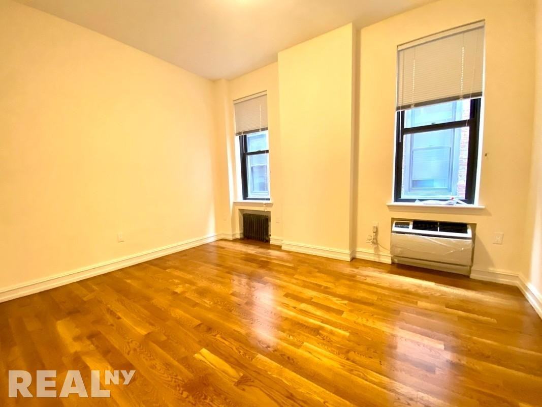 E 24th St #1A - Photo 3 of 5