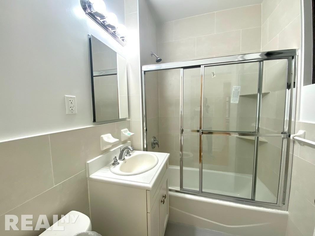 E 24th St #1A - Photo 5 of 5