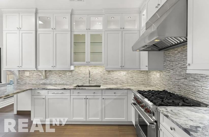 E 68th St - Photo 2 of 4