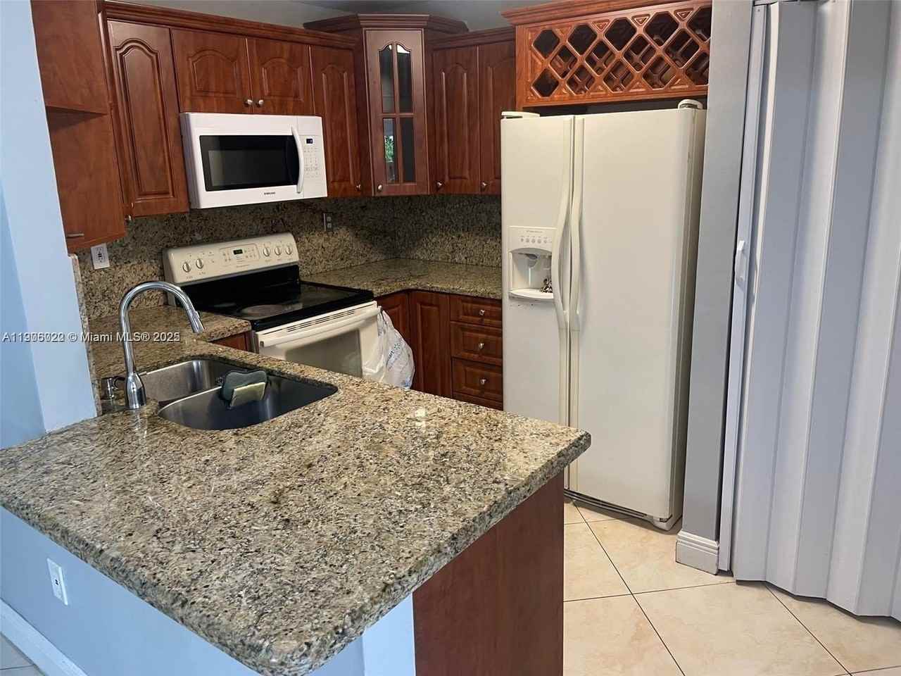 10302 Northwest 9th Street Circle #103 - Photo 3 of 25