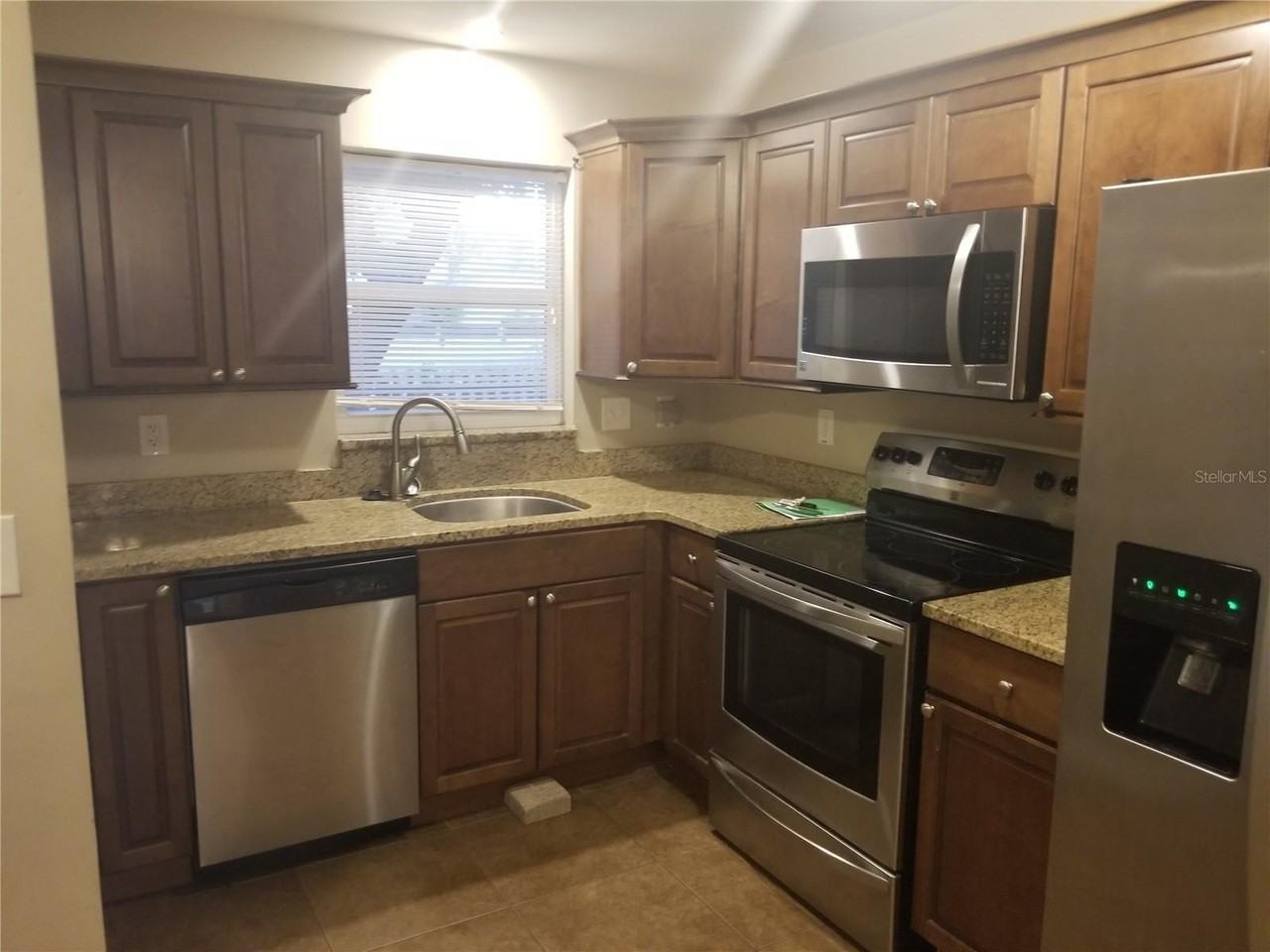 7100 Dartmouth Ave N #4 - Photo 3 of 19