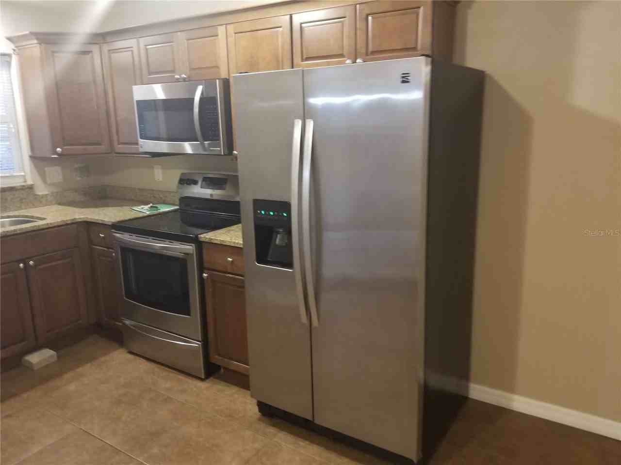 7100 Dartmouth Ave N #4 - Photo 6 of 19