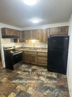 featured image of 105 E 14th St