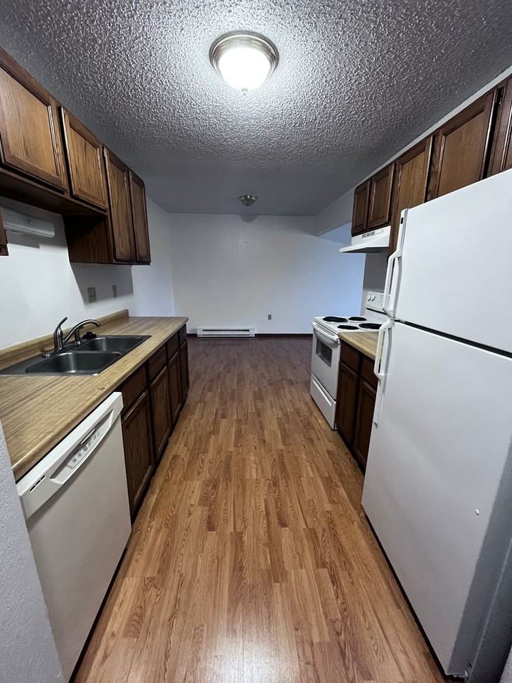 NP Apartments - Photo 7 of 11