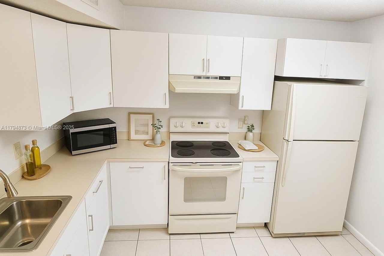 9001 Wiles Rd #103-3 - Photo 7 of 39