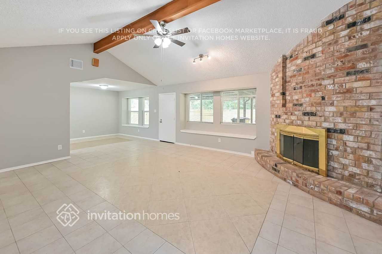 8703 Saratoga Forest Drive - Photo 3 of 16