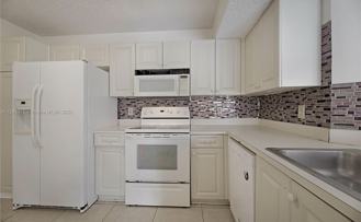 9055 Wiles Rd #204 - Photo 1 of 1