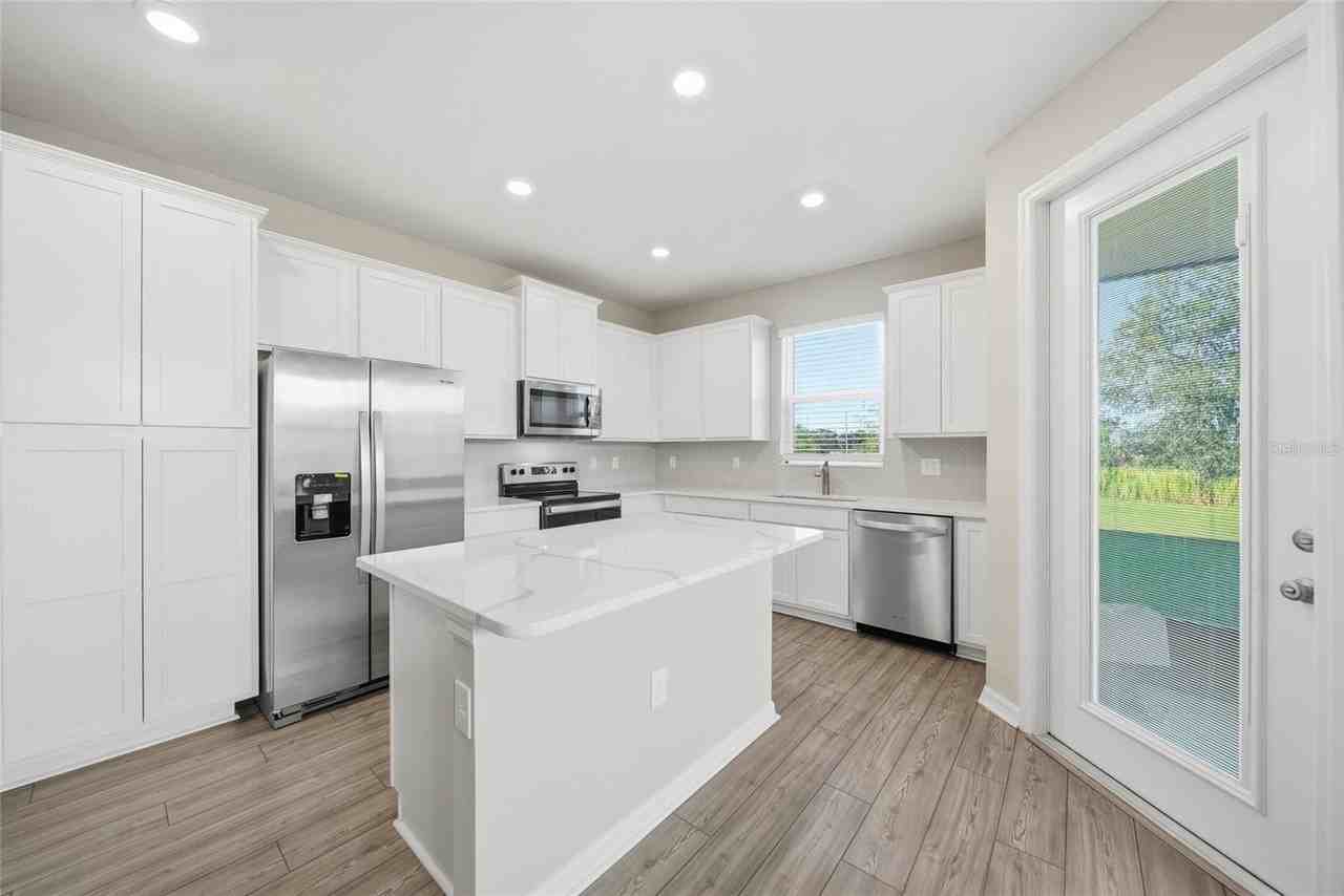 11405 Cay Spruce Way - Photo 7 of 34