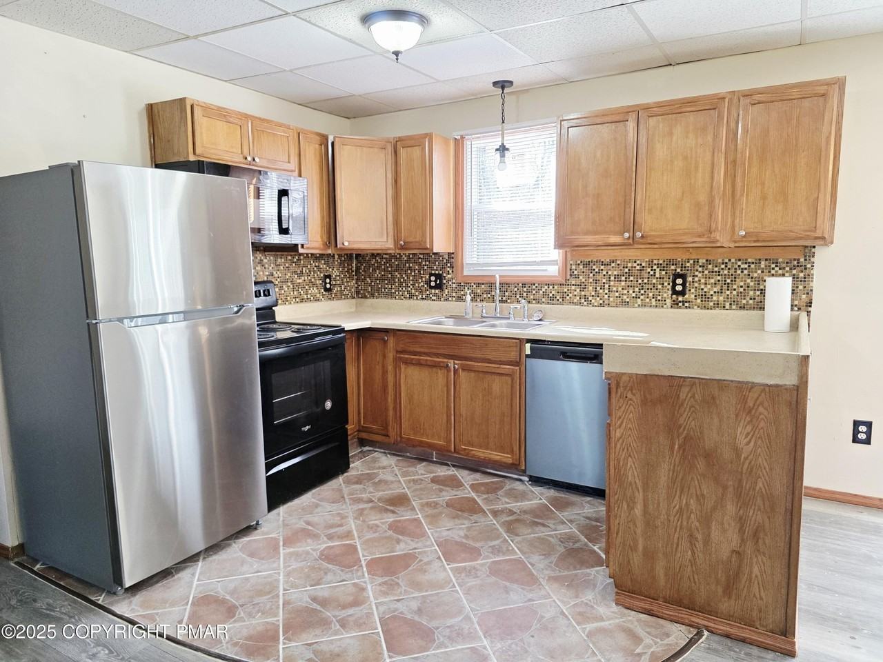 9040 Idlewild Dr - Photo 7 of 26