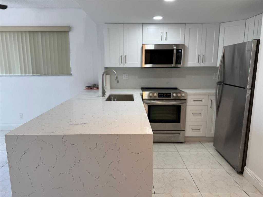 8031 Lagos De Campo Blvd #L3 - Photo 3 of 26