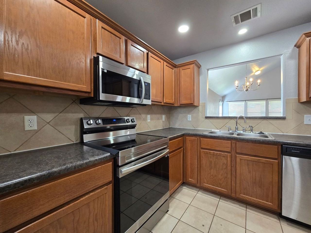 6311 Nessy Drive - Photo 3 of 30