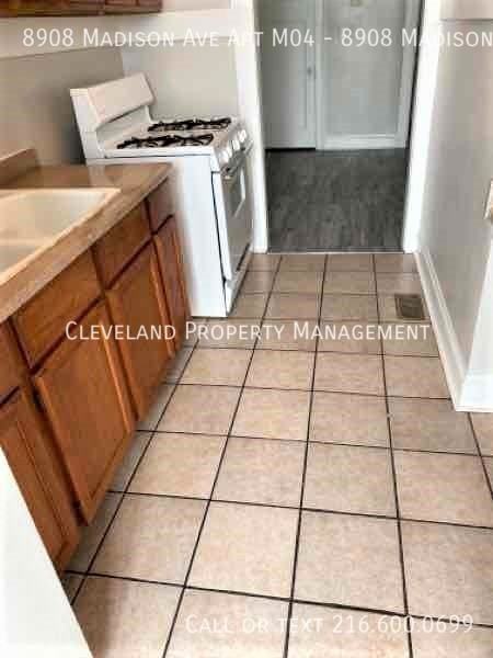 8908 Madison Ave Apt M04 - Photo 3 of 5