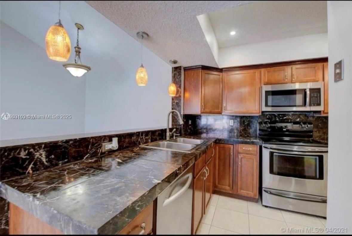 18850 Nw 57th Ave #306 - Photo 4 of 20