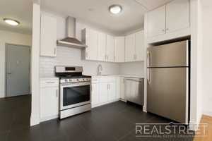 featured image of 9002 Queens Blvd #403