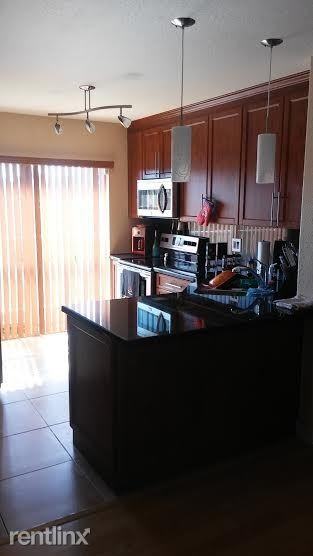 5755 NW 109th Ave - Photo 2 of 4