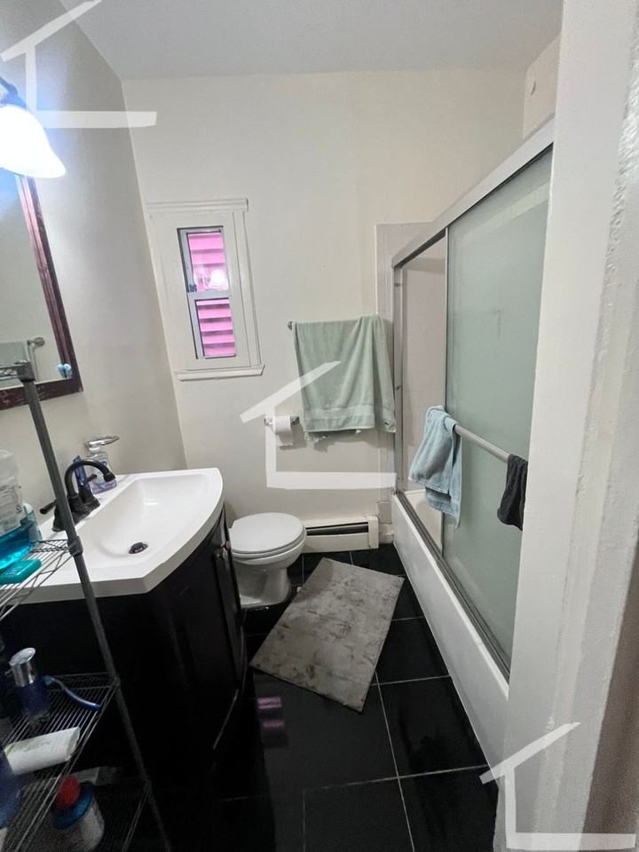 1582 Tremont St - Photo 3 of 8