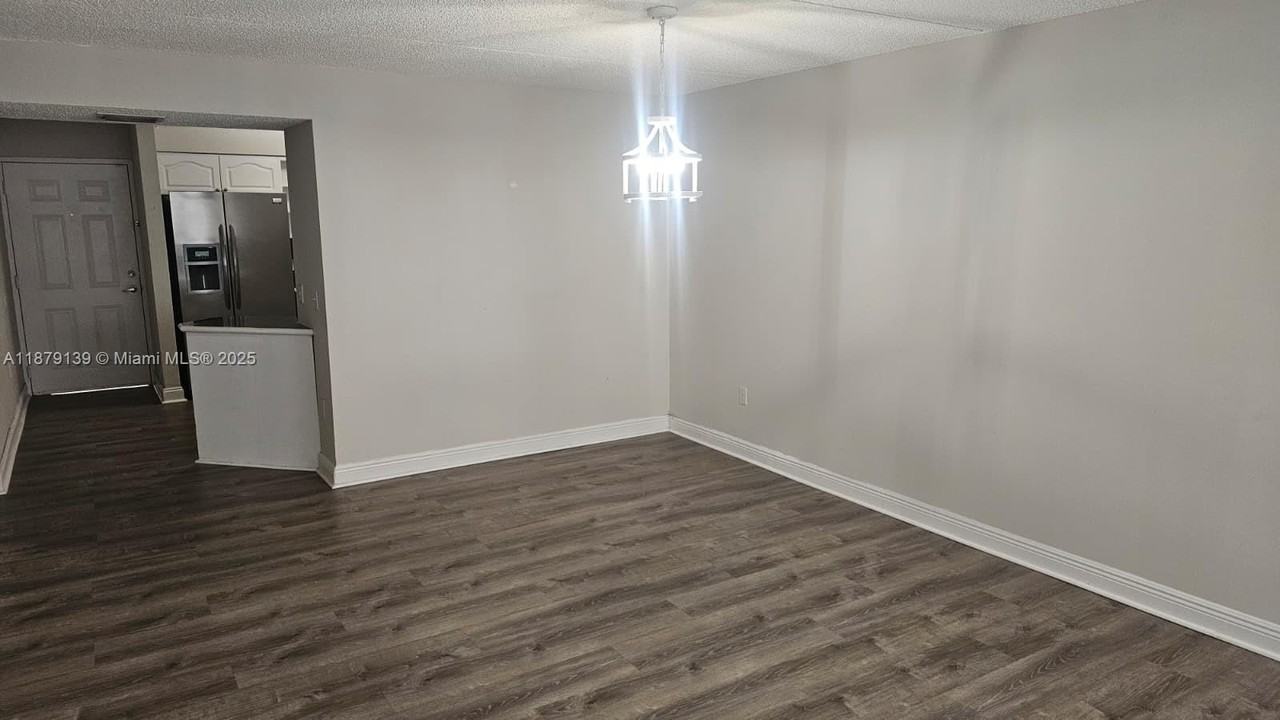 6115 Nw 186th St #105 - Photo 5 of 15