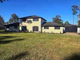 featured image of 310 310 W Pineshadows Dr - 310 W Pineshadows Drive