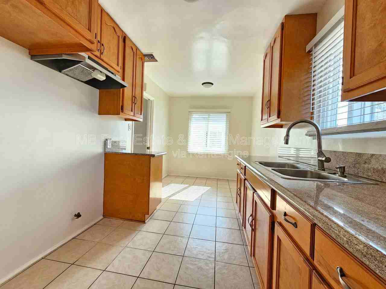 10619 Crenshaw Blvd #5 - Photo 4 of 13